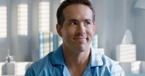 Ryan Reynolds in his pajamas in a white room in Free Guy