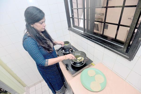Deep fried puri, made from unleavened wheat dough, is one of the staples at Arti's home during Deepavali.