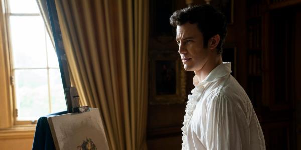 benedict paints next to a window in bridgerton season 2