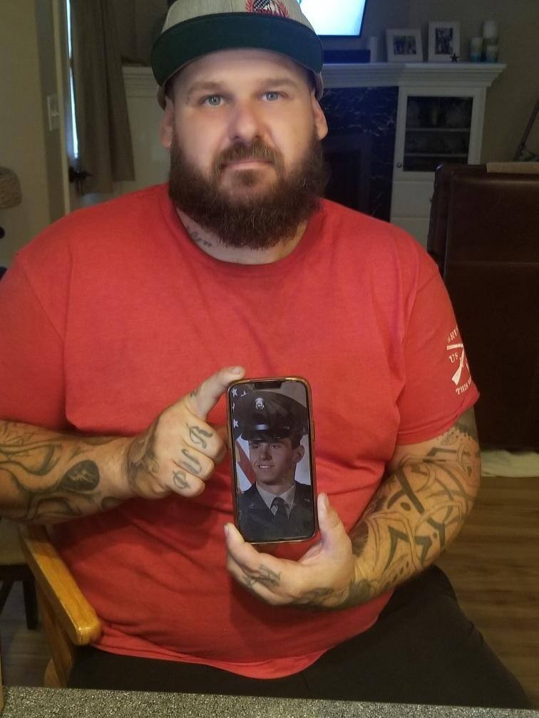 Brian Ambrose, of Chico, displays his Uncle William “Bill” Ambrose’s U.S. Army military portrait.  (Brian Ambrose)