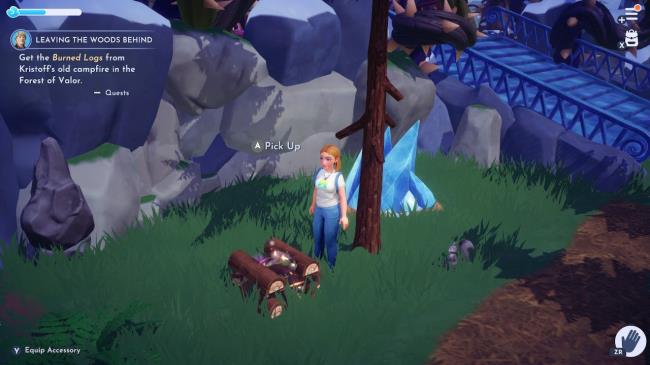 Disney Dreamlight Valley picture showing a campfire in the Forest of Valor, near the main entrance to Frosted Heights.