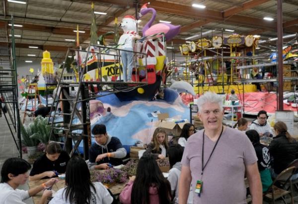 Timothy Zembek, Asst. Crew Chief, helps coordinate the volunteers as...