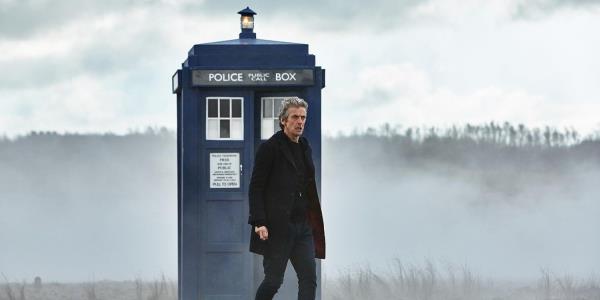 Peter Capaldi as the Doctor walking on a Skaro battlefield in Doctor Who